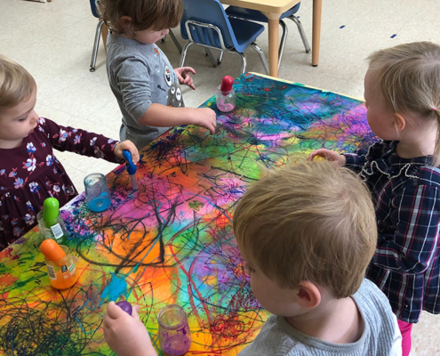 kids painting together