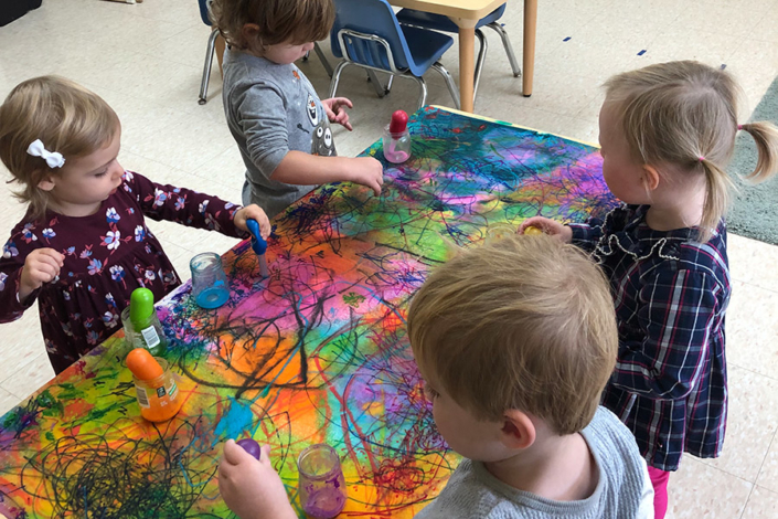 kids painting together